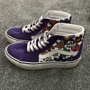 Vans high top special edition sneakers.  Purple suede with flowers.